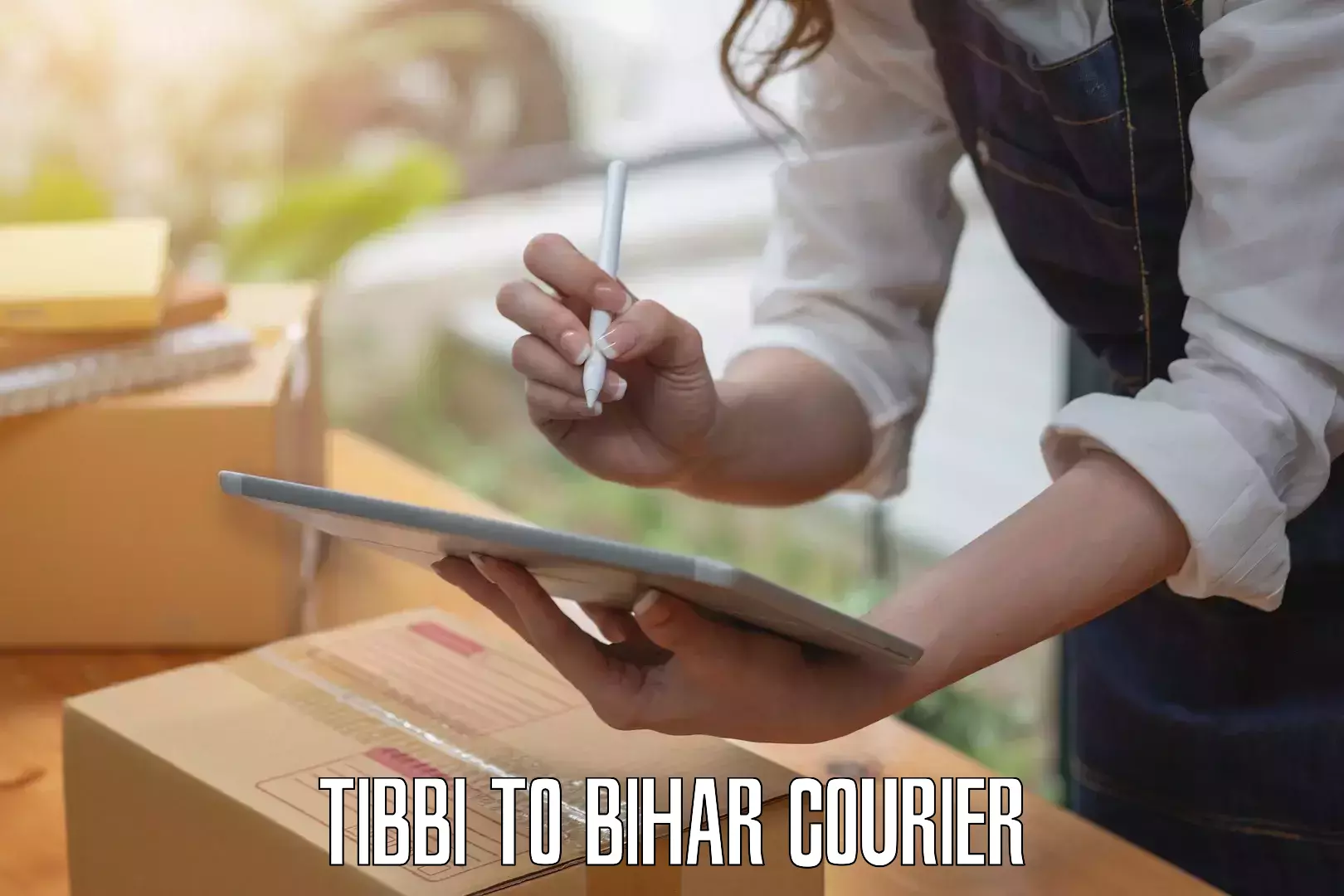 Baggage courier rates calculator Tibbi to Daudnagar